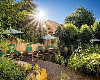 Wunsch Hotel Mürz - Natural Health & Spa Hotel - באד פוסינג - פטיו
