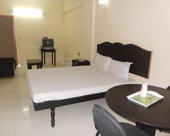 Hotel Span - Kozhikode - Camera da letto