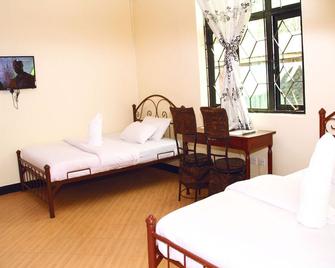 The Okaseni Lodge - Arusha - Bedroom