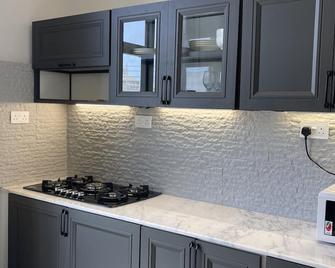 Rateel Apartments - Salalah - Kitchen
