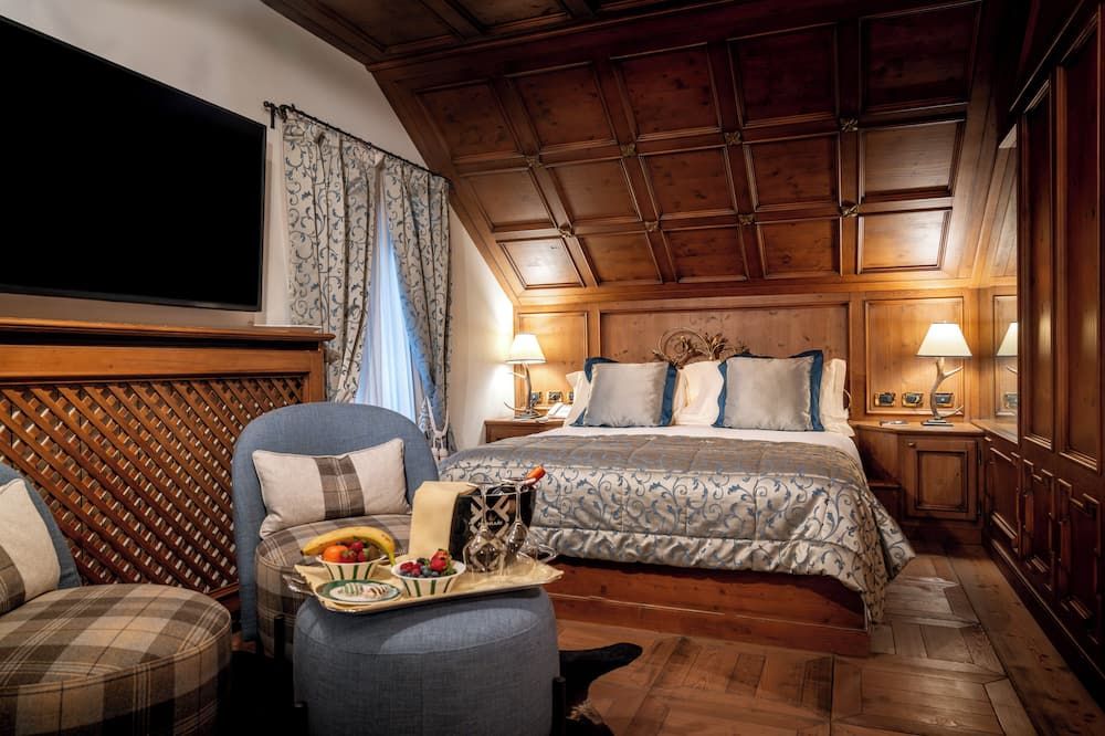 Ambra Cortina Luxury&Fashion Hotel - קורטינה ד'אמפצו - חדר שינה