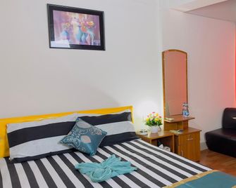 Dhanmondi Lake View Hotel - Dháka - Ložnice
