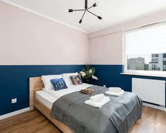 Poznań Serbska Apartament z Parkingiem by Renters - Poznan - Bedroom
