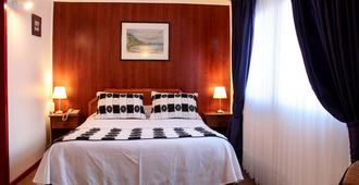 Hotel Luanco - טמוקו - חדר שינה
