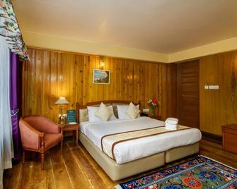 Muscatel Himalayan Resort - 400 Mts from Mall Road - דאריילינג - חדר שינה