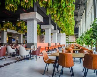 Vogo Grand Hotel Academic City Dubai - Dubai - Restaurant
