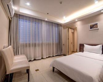 Super 8 by Wyndham Zhuozhou Fan Yang Lu - Langfang - Habitación