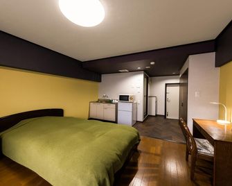 Business & Cycle Hotel Bell - Yukuhashi - Schlafzimmer