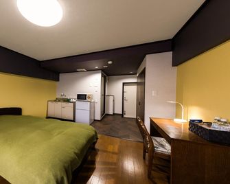Business & Cycle Hotel Bell - Yukuhashi - Ložnice
