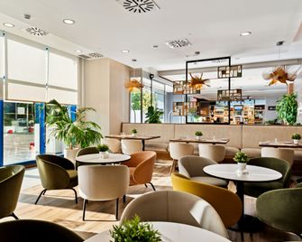 Hilton Garden Inn Sevilla - סביליה (ספרד) - מסעדה