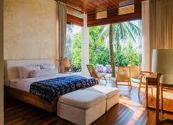 Four Bedroom Villa with Private Pool with Sea View in Lombok - Kuta - Bedroom