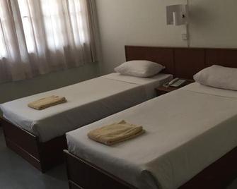 Ymca International Hotel Chiang Rai - Chiang Rai - Schlafzimmer