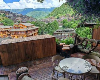 Xijiang Story Vacation Apartment (Xijiang Qianhu Miao Village No. 4 Wind and Rain Bridge) - Qiandongnan - Balkon