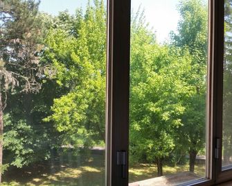 Very quiet ca july holiday home surrounded by a wooded park - Ferrara - Balcony