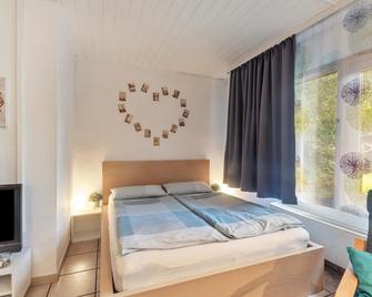 1 Zimmer Ferienwohnung - Lohfelden - Slaapkamer