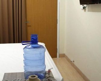 Green Leaf Guest House Jogja By Sinergi - Depok - Servicio de la habitación