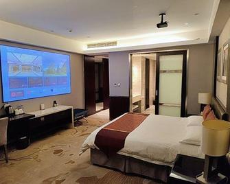 Chuanyu Holiday Hotel - Yancheng - Schlafzimmer