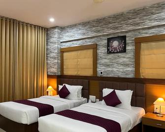 Hotel Floral Palace - Kottayam - Ložnice