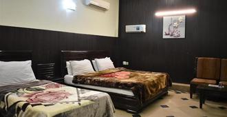 Hotel Afandi - Peshawar - Bedroom