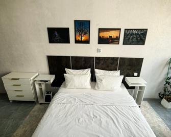 Aparthotel Na Tverskoy - Nizhny Novgorod - Bedroom