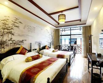 Zhangjiajie Xiangheju Inn (Wulingyuan Scenic Area) - Zhangjiajie - Habitación