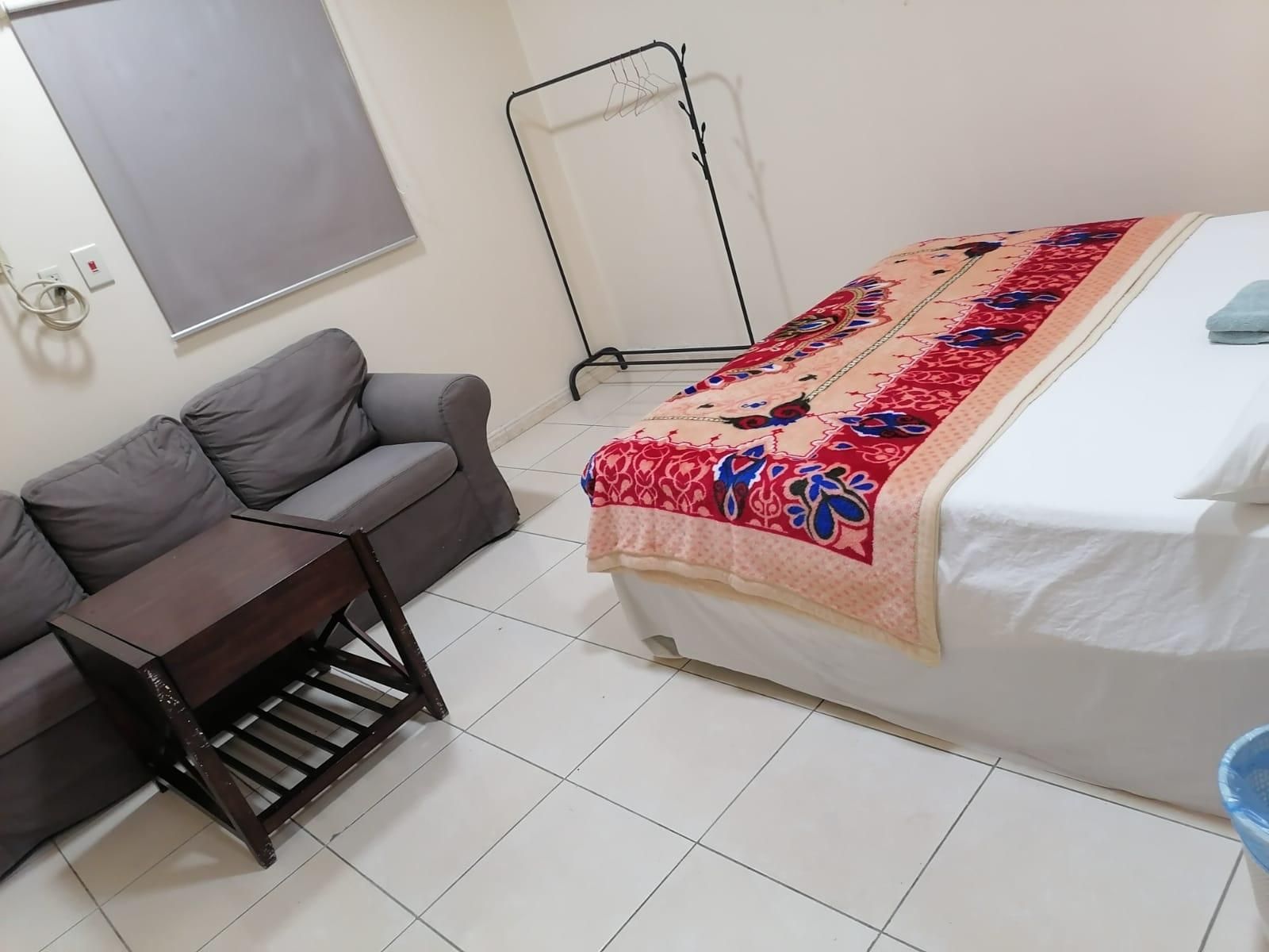 Q Economy Hotel 100 - الدمام - غرفة نوم