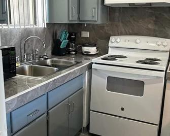 Beautiful Condos walking distance to a private beach! - Tamuning - Kitchen