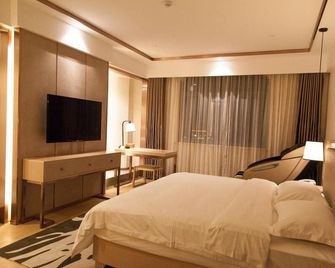 Puheart Hotel (Bozhou Wanda Plaza) - Bozhou - Спальня