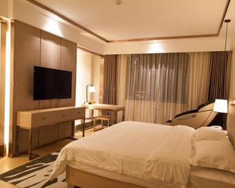 Puheart Hotel (Bozhou Wanda Plaza) - Bozhou - Schlafzimmer