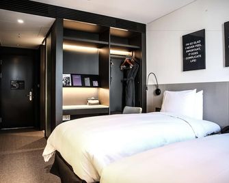 جي إل إيه دي غانغنام سي أو إي إكس سينتر - سيول - غرفة نوم