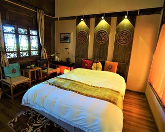 Lijiang Lvyeanjia Inn - Lijiang - Bedroom