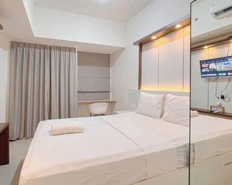 Comfort Studio Room At Vida View Apartment - Makasar - Sypialnia