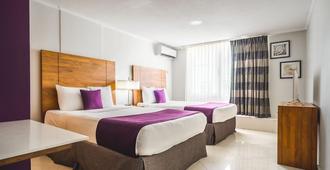 City Suites & Beach Hotel - Willemstad - Yatak Odası
