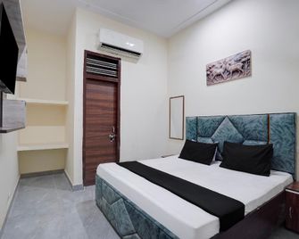 Hotel O The Signature Residency - Rohtak - Bedroom