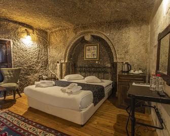 Century Cave Hotel - גורמה - חדר שינה