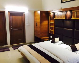 Hotel Kahkashan - Mussoorie - Phòng ngủ
