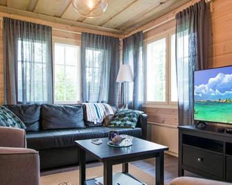 Holiday Home Runopuro by Interhome - Rautalampi - Sala de estar