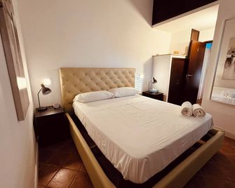 Swim Apartment Fronte Mare - Catania - Makuuhuone