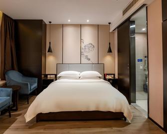 Huaya International Hotel (Weifang High-speed Railway North Station) - Weifang - Bedroom