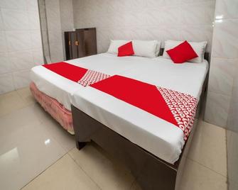 OYO 448 Pvc Hotel - Tagum - Bedroom