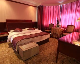 Jinta Hotel - Jiuquan - Bedroom