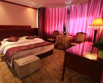 Jinta Hotel - Jiuquan - Slaapkamer