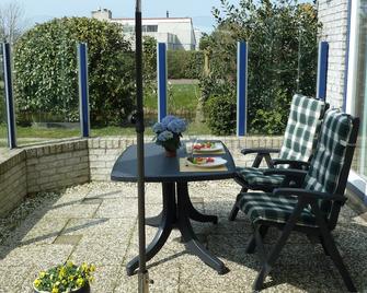 Comfortable home near beach, between golf course and tulip fields - Julianadorp - Patio