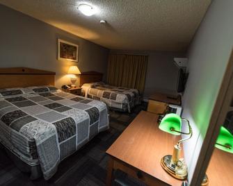 Olympia Lodge - Calgary - Schlafzimmer