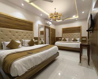 Hotel Golden Veena - Mount Abu - Ložnice