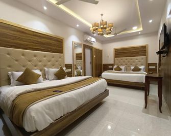 Hotel Golden Veena - Mount Abu - Schlafzimmer