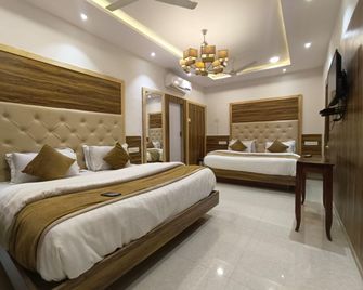 Hotel Golden Veena - مونت أبو - غرفة نوم