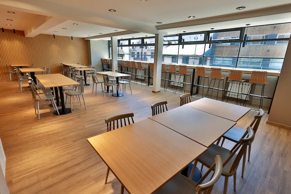 M383 Hotel Bariloche - סן קרלוס דה ברילוצ'ה - מסעדה