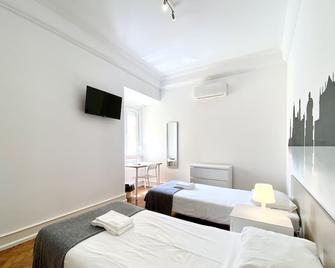 Home Out Rooms & Apartments - Lissabon - Schlafzimmer
