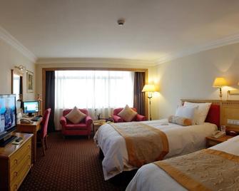 Gold Source Sunshine Hotel - Changsha - Bedroom